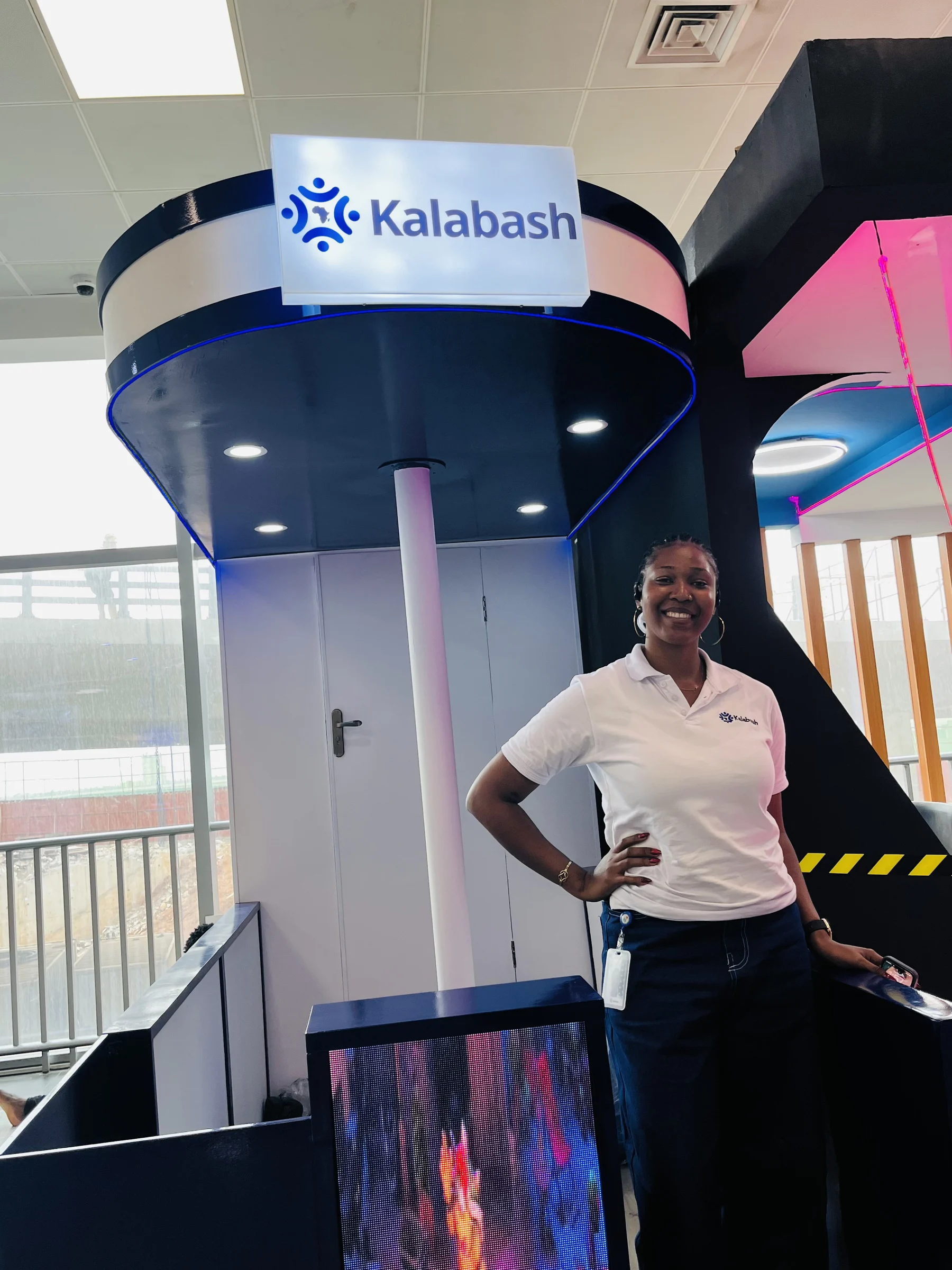 A Kalabash agent at the Kalabash Kiosk at Lagos airport, where visitors apply for the Naira card